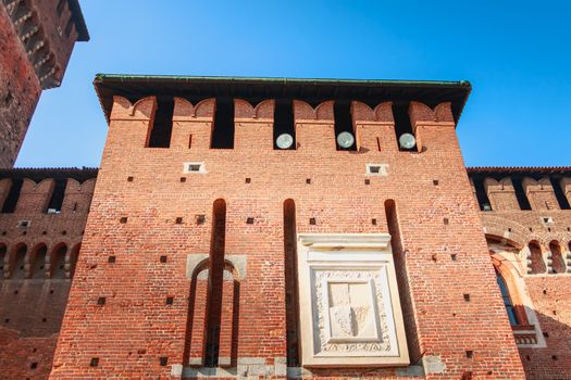 Milan, Italy - November 03, 2017: architectural detail of the facade of the Castle of Sforza on a fall day, a fortress built in the fifteenth century by Francesco Sforza, Duke of Milan