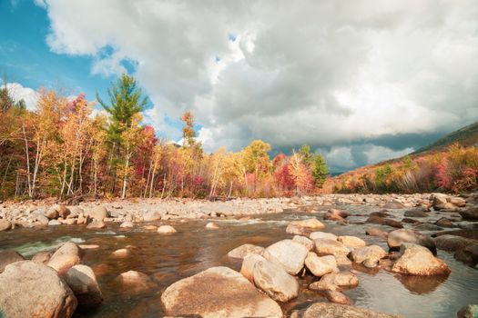 View along rugged and picturesque Pemigewasset River at base of Loon Mountain Lincoln New Hampsire, USA.