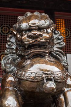 Bronze lion statue in a buddhist temple, Chengdu, China
