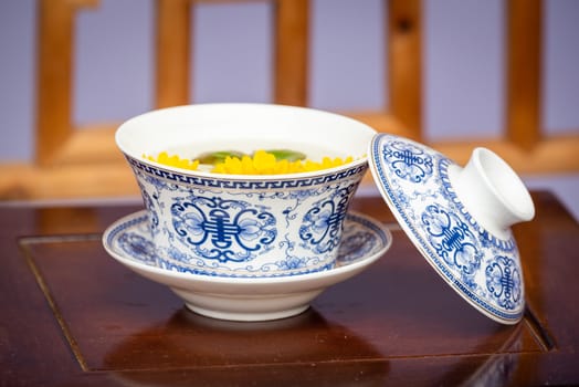 tea cup on a wooden table close-up view