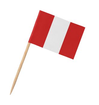 Small paper flag of Peru on wooden stick, isolated on white