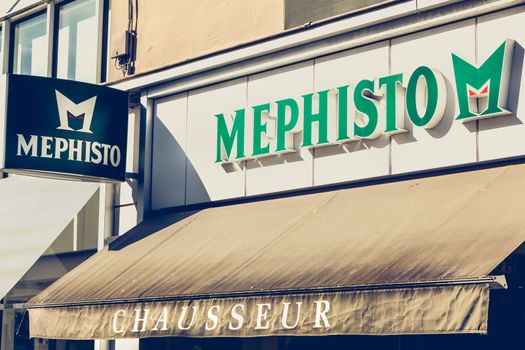 Challans, France - August 11, 2016 : front of a shoe store of the brand Mephisto on a summer day