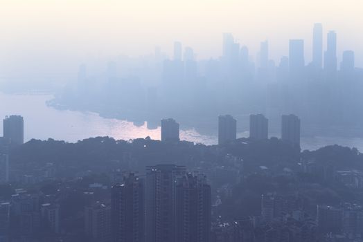 Chongqing city skyline aerial view in the fog in daylight, China