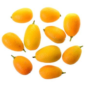 Group of fresh kumquat close up top view isolated on white background.