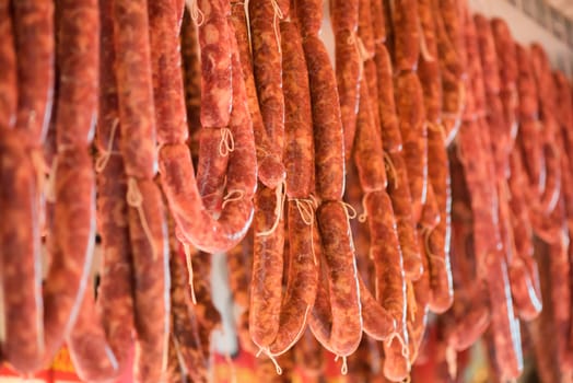 Sausages hanging in a market in China