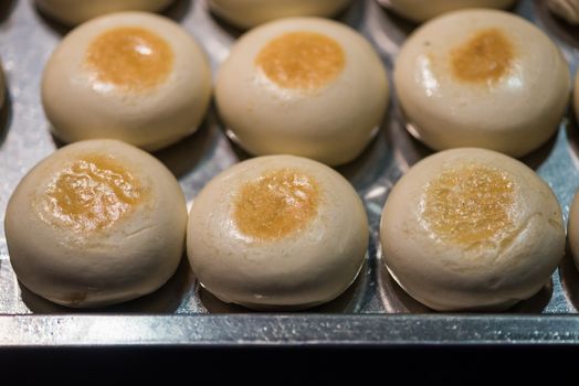 Guoqui sweet chinese steam buns in a market in China