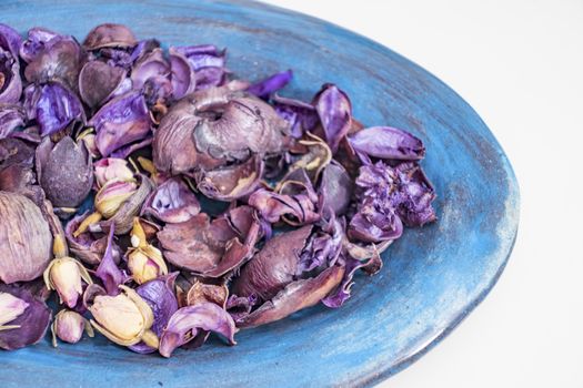 dried rose petals in a bowl