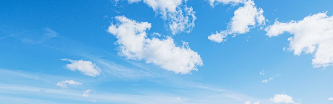 Bright blue sky with clouds, nature and environmental background