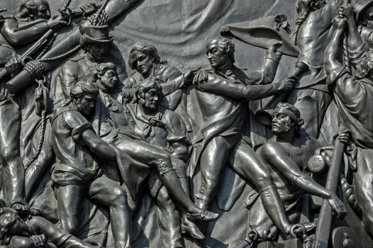 Bronze bas relief on the base of Nelson's Column showing the Death of Admiral Lord Nelson at the Battle of Trafalgar, Westminster, London.  Sculpted by John Edward Carew, on public display since 1849.