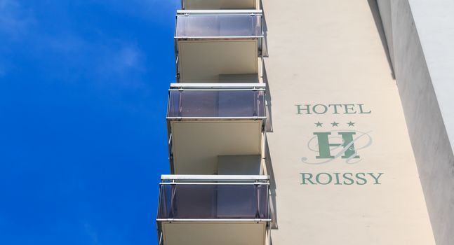 Lourdes, France - June 22, 2017 : example of a hotel to welcome pilgrims in the center of Lourdes. Here the hotel Roissy on a summer day