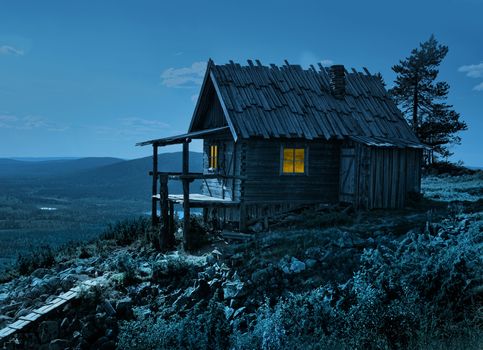 Santa Claus secret cottage on Lapland fell top in summer night