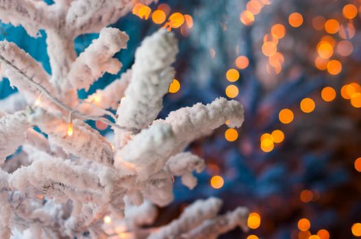 Chrismas tree and illuminated decoration selective focus background