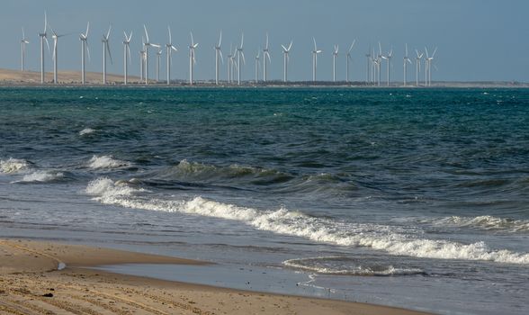 Wind farm on the beach of Canoa Quebrada in Brazil