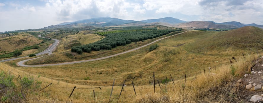 Panoramic landscape of countryside and the Galilee mountains in the Hula Valley, view from Tel Hazor, Northern Israel