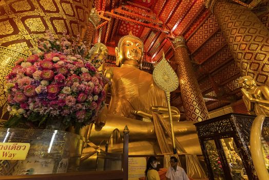 Ayutthaya, Thailand -July, 31, 2018 : Giant golden Buddha in Wat Phanan Choeng, Buddha statue is called Luang Pho Tho of Ayutthaya, Thailand