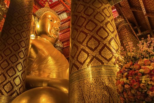 Ayutthaya, Thailand -July, 31, 2018 : Giant golden Buddha in Wat Phanan Choeng, Buddha statue is called Luang Pho Tho of Ayutthaya, Thailand