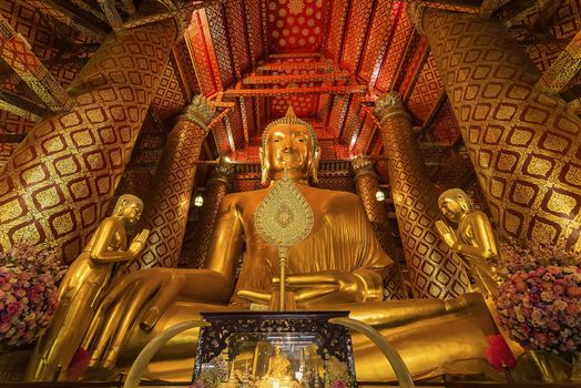 Ayutthaya, Thailand -July, 31, 2018 : Giant golden Buddha in Wat Phanan Choeng, Buddha statue is called Luang Pho Tho of Ayutthaya, Thailand