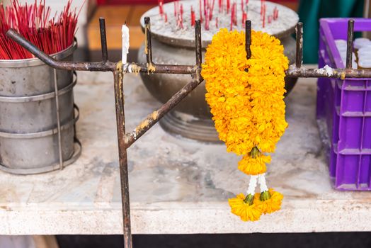 Garlands to pray Lord Buddha in temple.