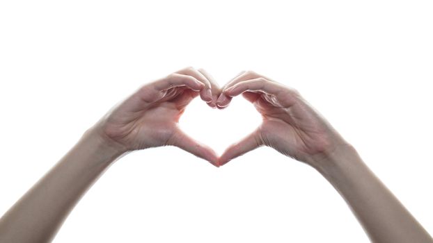 Woman holding hands in heart shape, a sign of love on white isolated background.
