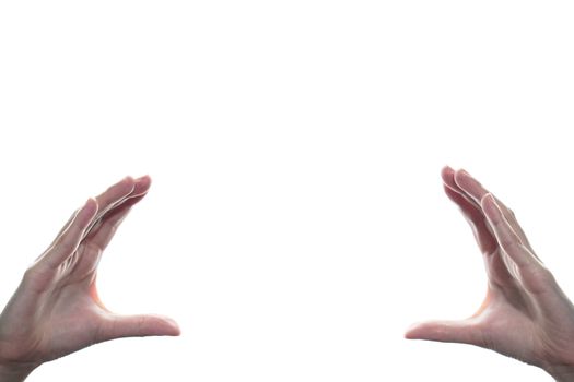 Female open cupped hands with empty between on white isolated background.