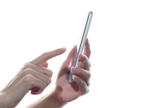 Side view of woman hand holding and touching smartphone isolated on white background.