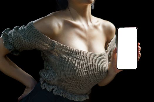 Sexy woman showing white blank display of her mobile phone.