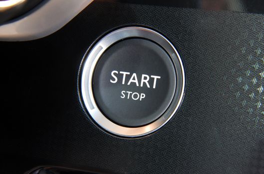 Start stop engine button on a modern car dashboard