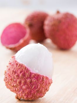 lichee fruit on wooden background close up