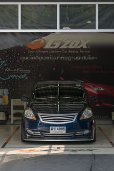 Bangkok, Thailand - December 12, 2015 : Unidentified car care staff cleaning the car (Car detailing).