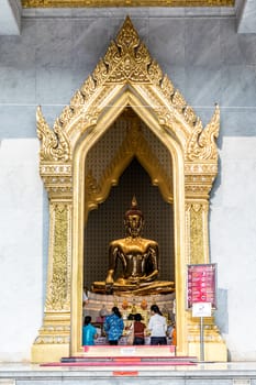 Bangkok, Thailand - March 11, 2016 : Thai buddha statue at Wat Traimitr Withayaram is a important Thai temple in Chinatown Bangkok, Thailand.