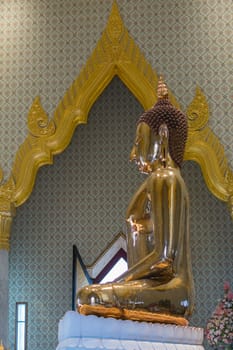 Bangkok, Thailand - March 11, 2016 : Thai buddha statue at Wat Traimitr Withayaram is a important Thai temple in Chinatown Bangkok, Thailand.