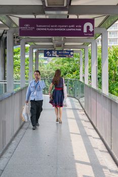 Bangkok, Thailand - March 31, 2016 : Skywalk at BTS skytrain train in Bangkok. Many people in Bangkok used skytrain to save time.