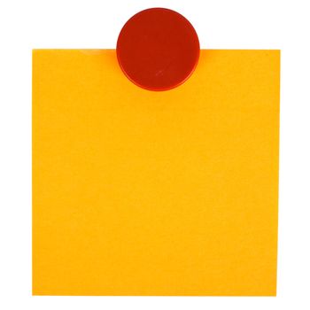 Adhesive note and magnet button on whiteboard.