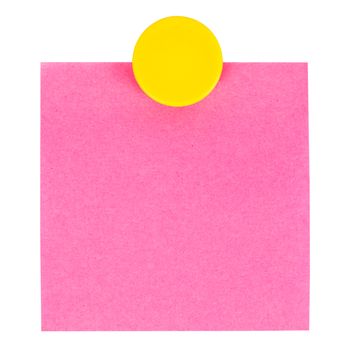 Adhesive note and magnet button on whiteboard.