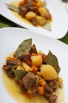 Beef stew with potatos and carrots.