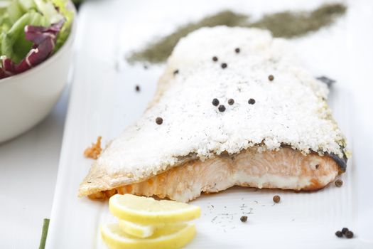 Salt-roast salmon with lemon and dill.