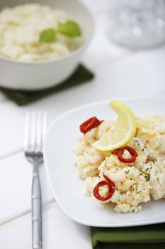 Scrambled eggs with prawns and hake and cauliflower mashed with leek.