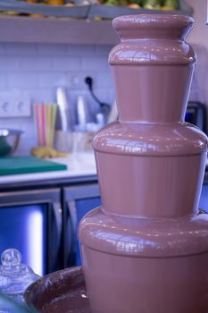 Chocolate fountain in a kitchen