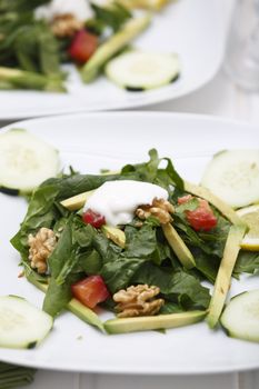 Spinach salad with lox and avocado.