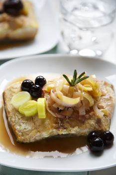 Salmon with blueberries.