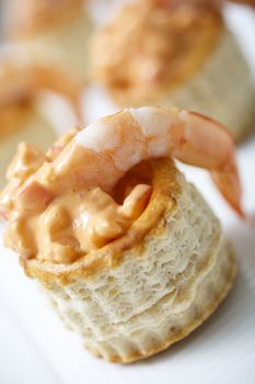 Delicious tarts with prawn, crab and thousand island dressing. Selective focus.
