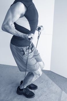 Performing exercises with resistance rope fitness
