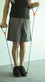 Performing exercises with resistance rope fitness