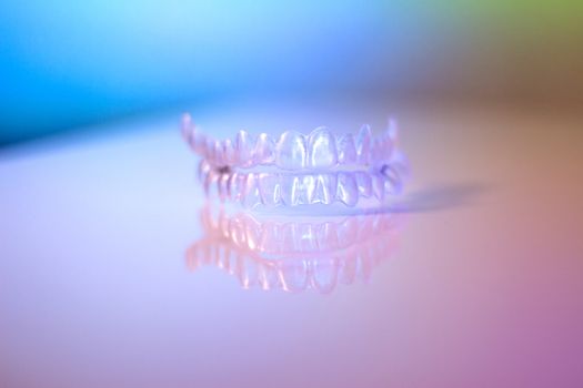 Denture plastic dental retainer to align teeth