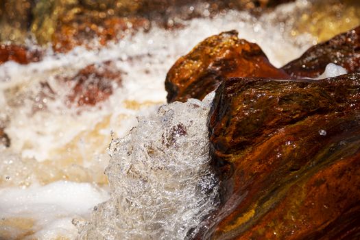 Beautiful landscape in Huelva, Rio Tinto, small cascade with water flowing