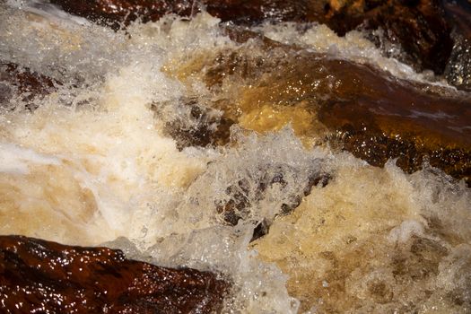 Beautiful landscape in Huelva, Rio Tinto, small cascade with water flowing