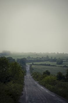 Landscape of the mountain and prairie in a foggy day