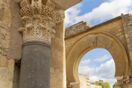 Cordoba, Spain -  November 1 2019: Fragment of wall with floral paterns in 10th century ruined Moorish medieval city Medina Azahara in Andalucia on November 1, 201. UNESCO world heritage site.