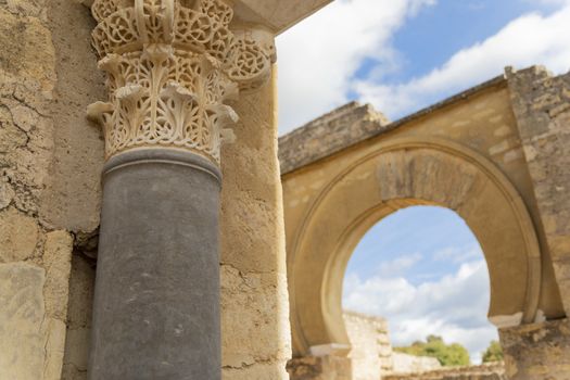 Cordoba, Spain -  November 1 2019: Fragment of wall with floral paterns in 10th century ruined Moorish medieval city Medina Azahara in Andalucia on November 1, 201. UNESCO world heritage site.