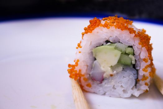 Sushi prepared for eating in restaurant